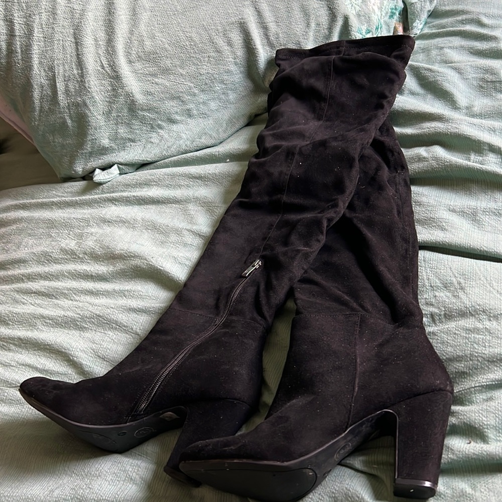 Thigh high heeled black boots